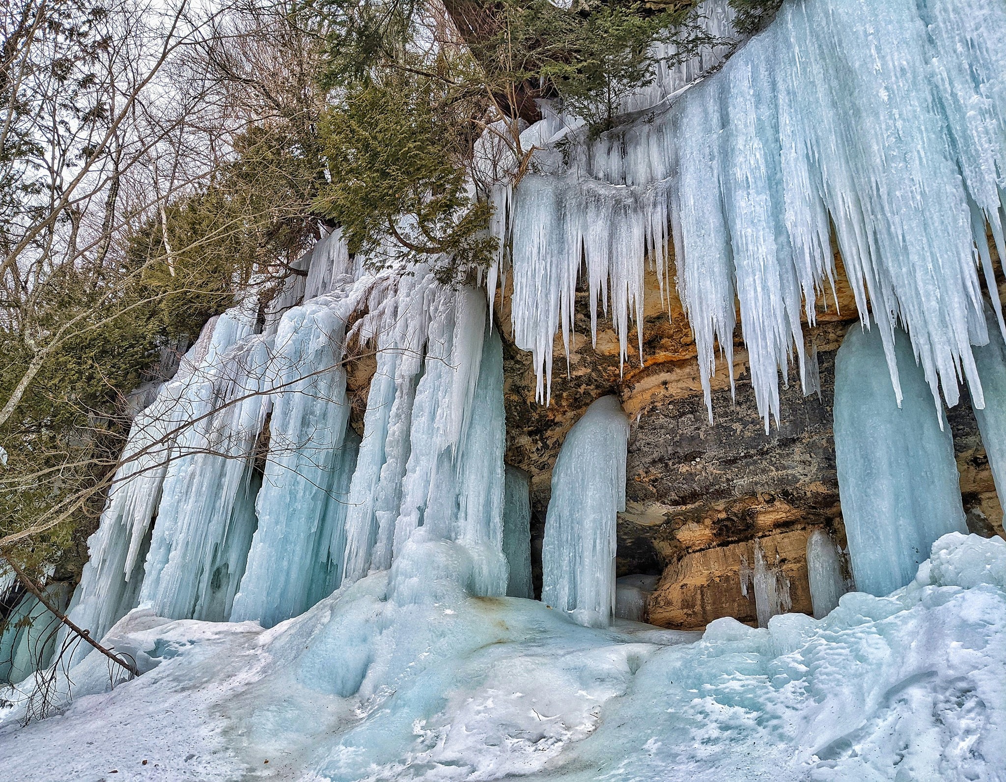 Featured image for “Exploring the Sand Point Ice Curtains in Munising, MI”